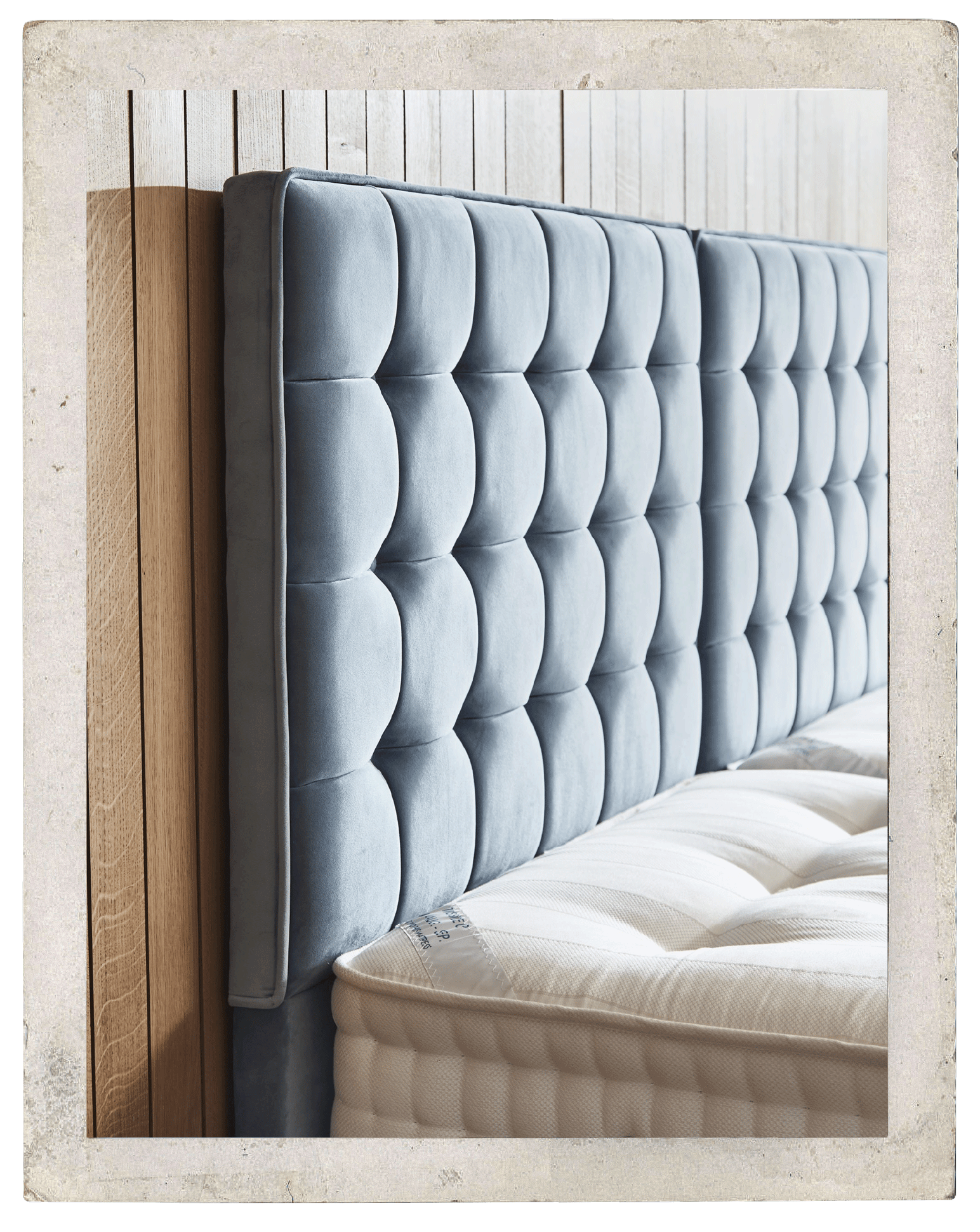 A close up shot of a padded headboard