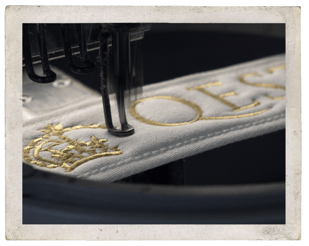 The royal warrant being embroidered onto a Sleepeezee mattress